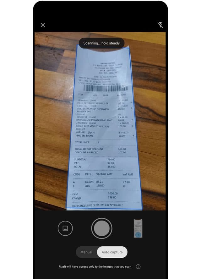 Rizzit app scanning a real receipt with live edge detection